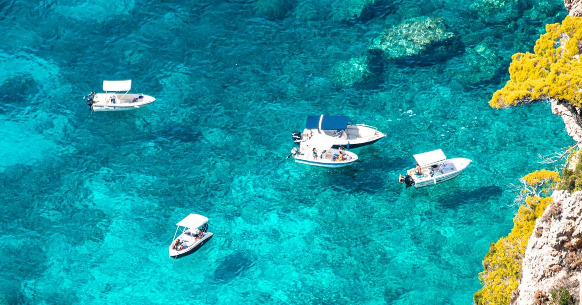 Aerial view of Paleokastritsa's turquoise bays and cliffs